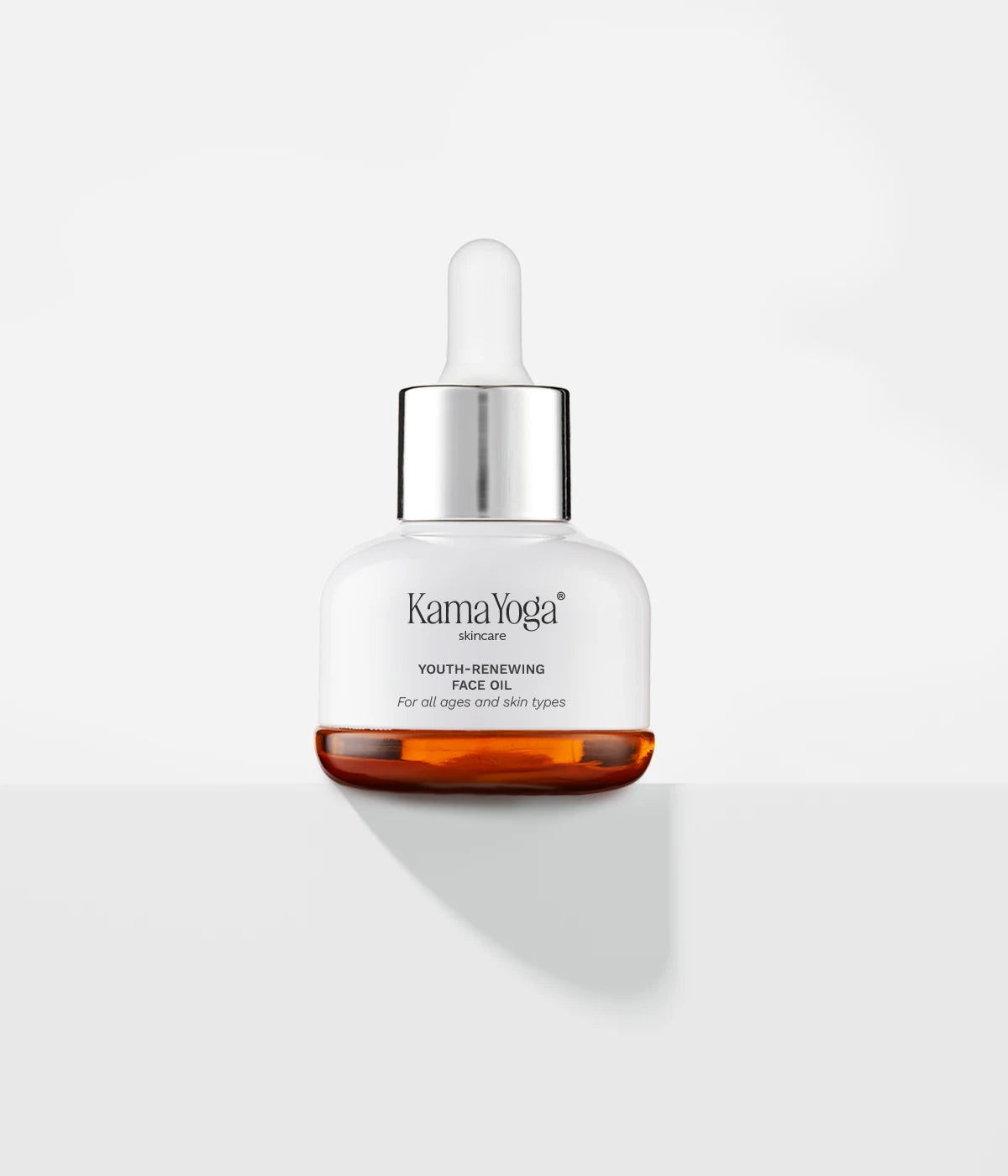 Luxury Kumkumadi Tailam Face Oil with Saffron for wrinkles and dark spots
A bottle of KARMA YOGA face youth-renewing oil with a dropper, on a white background. Face Youth-Renewing Oil bottle with Kansa Wand massager for anti-aging